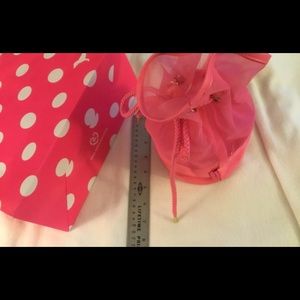 Pink Victoria’s Secret mesh make up bag with tie.